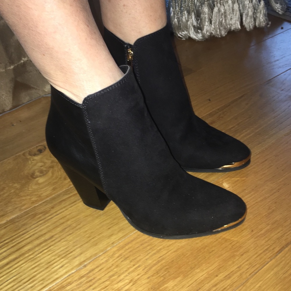 JustFab black ankle boots.